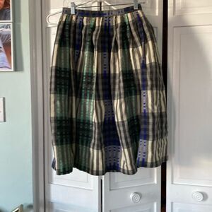Vintage pleated 100% wool circle skirt.  Size 12, made in usa.